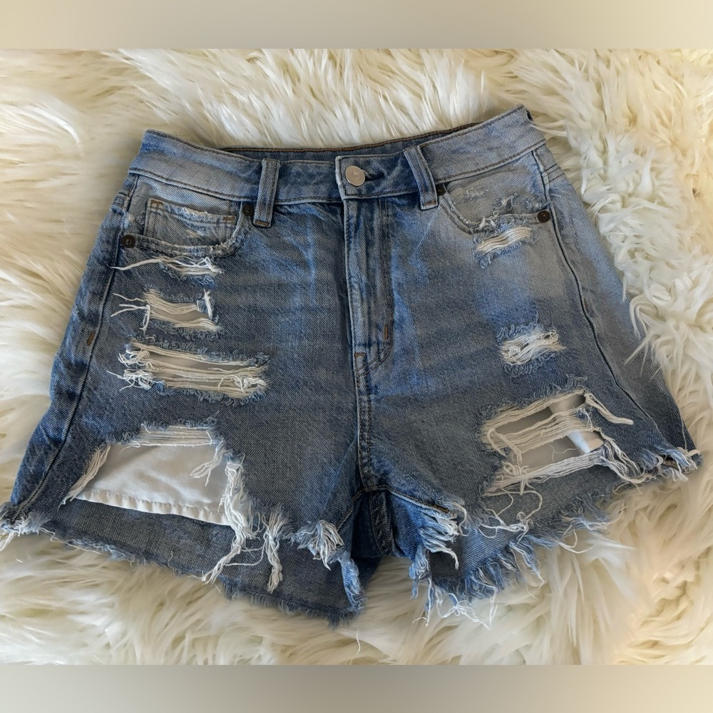 Blue ripped shorts